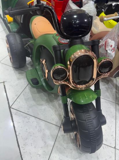 صورة دباب أطفال كهربائي ثلاثي العجلات